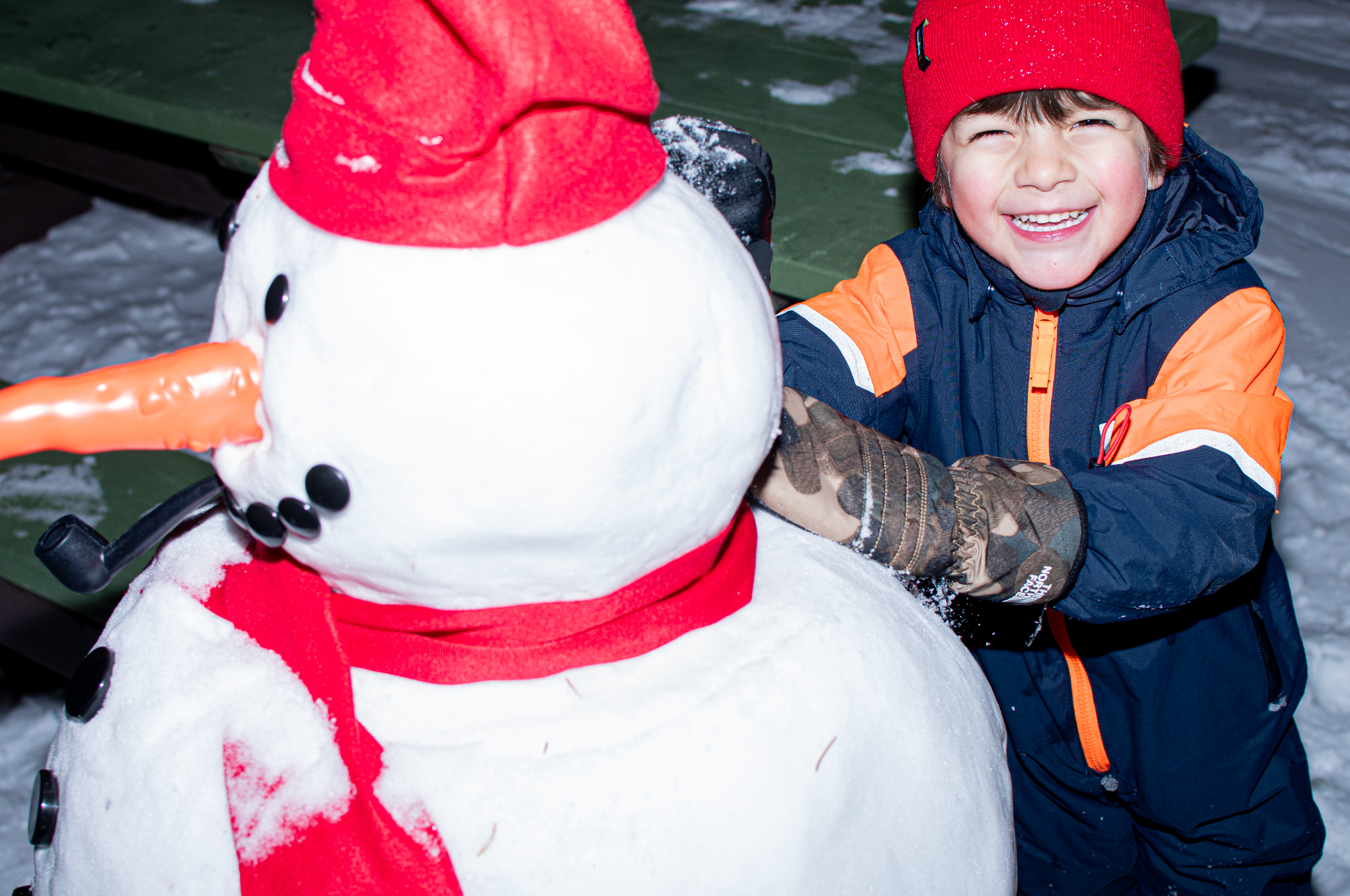 Santa sitting with kids on the chairlift