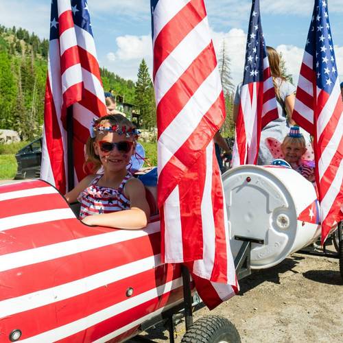 Kids on 4th of July float at Brighton Resort