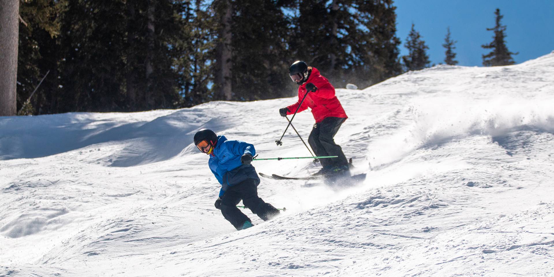 Skier taking a ski school lesson at Brighton in Utah