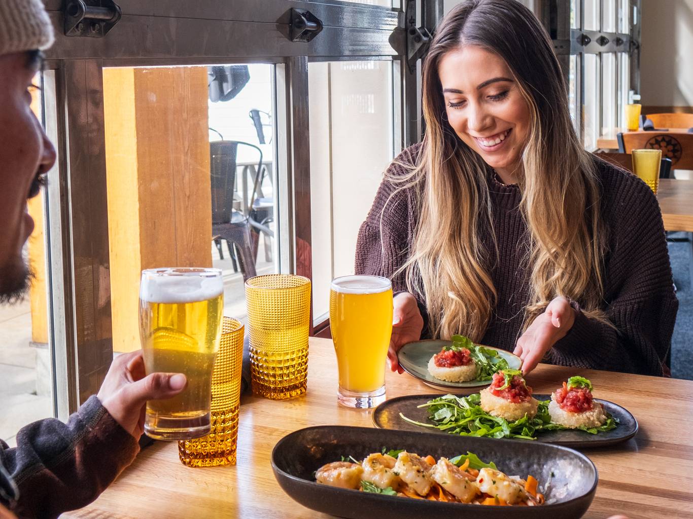 Couple eating at the Milly Chalet