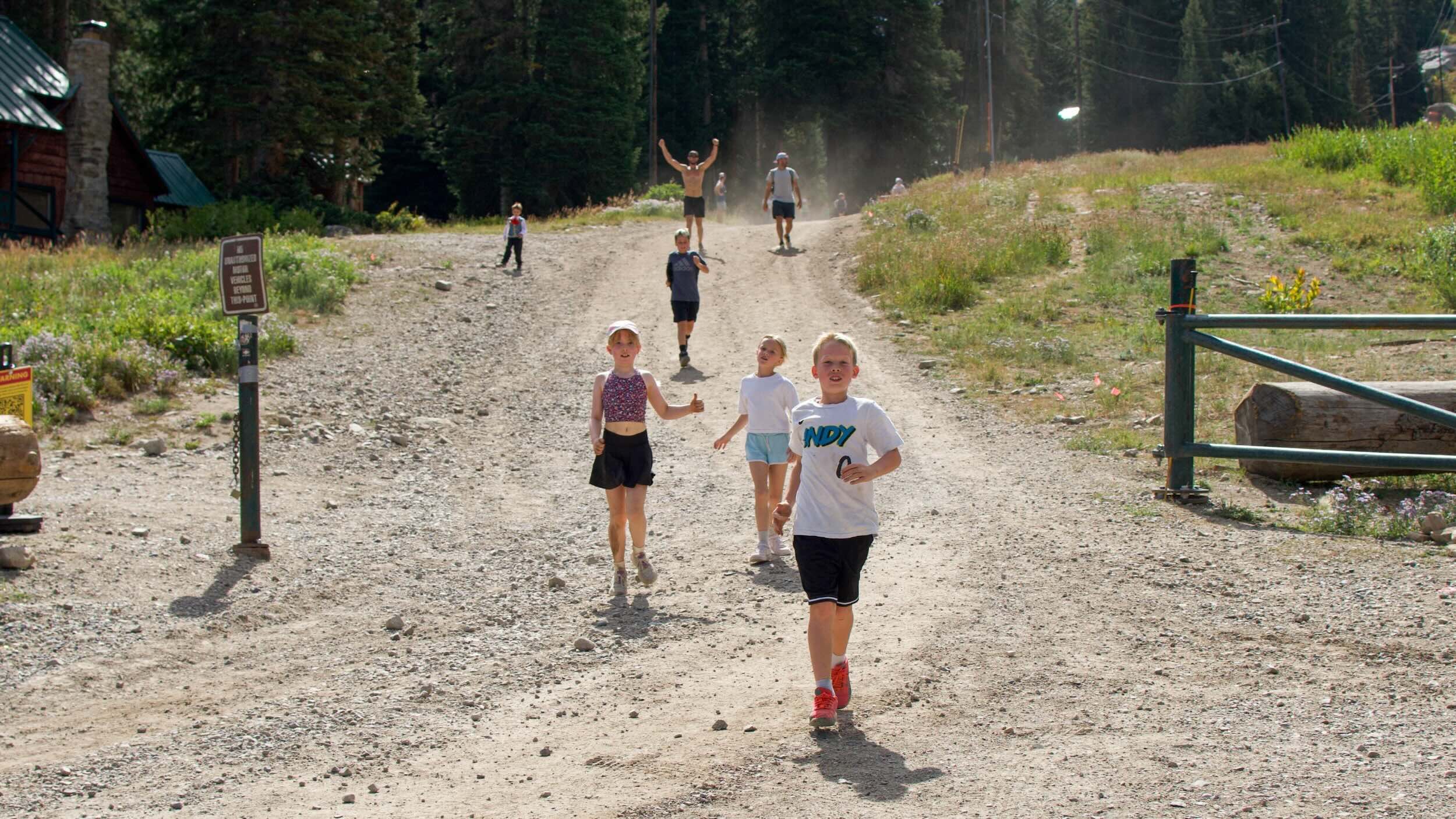 Family running the Majestic Scramble at Brighton Resort in the summer