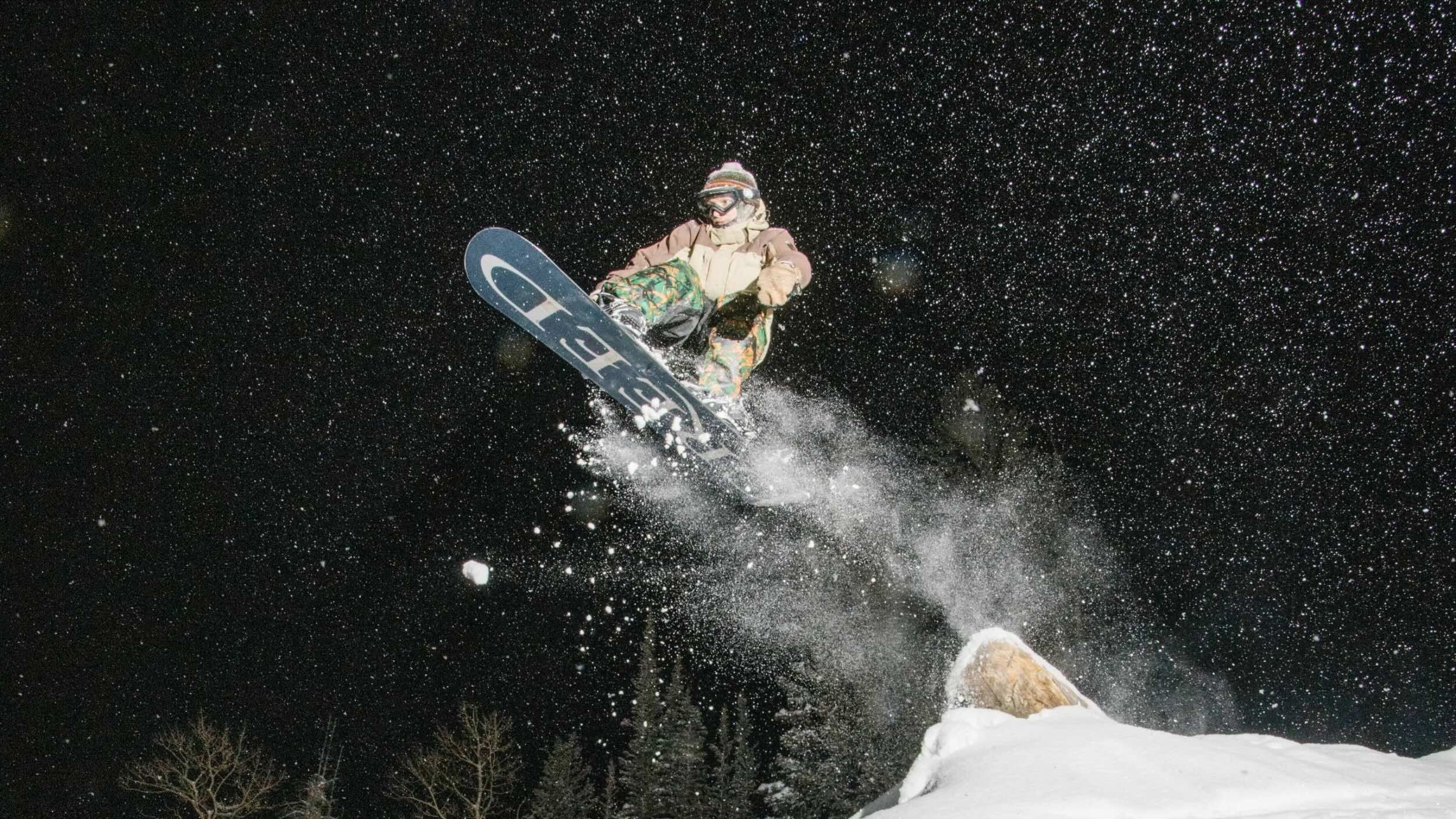 Snowboarder night riding at Brighton Ski Resort