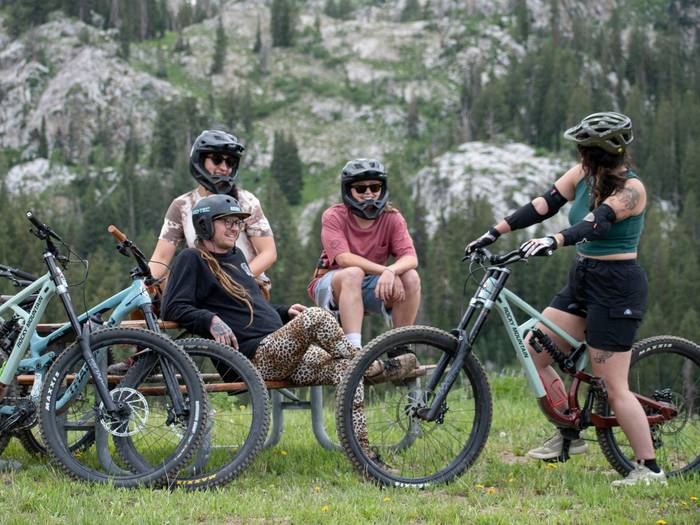 Group of friends mountain biking together at Brighton Resort