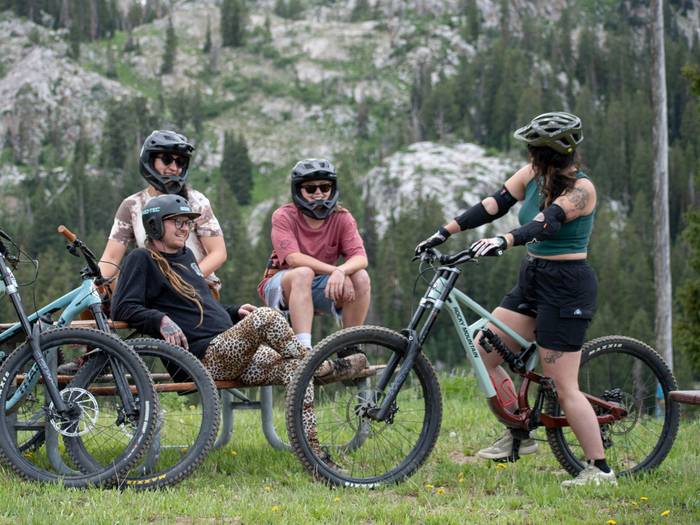 Group of friends mountain biking together at Brighton Resort in Utah