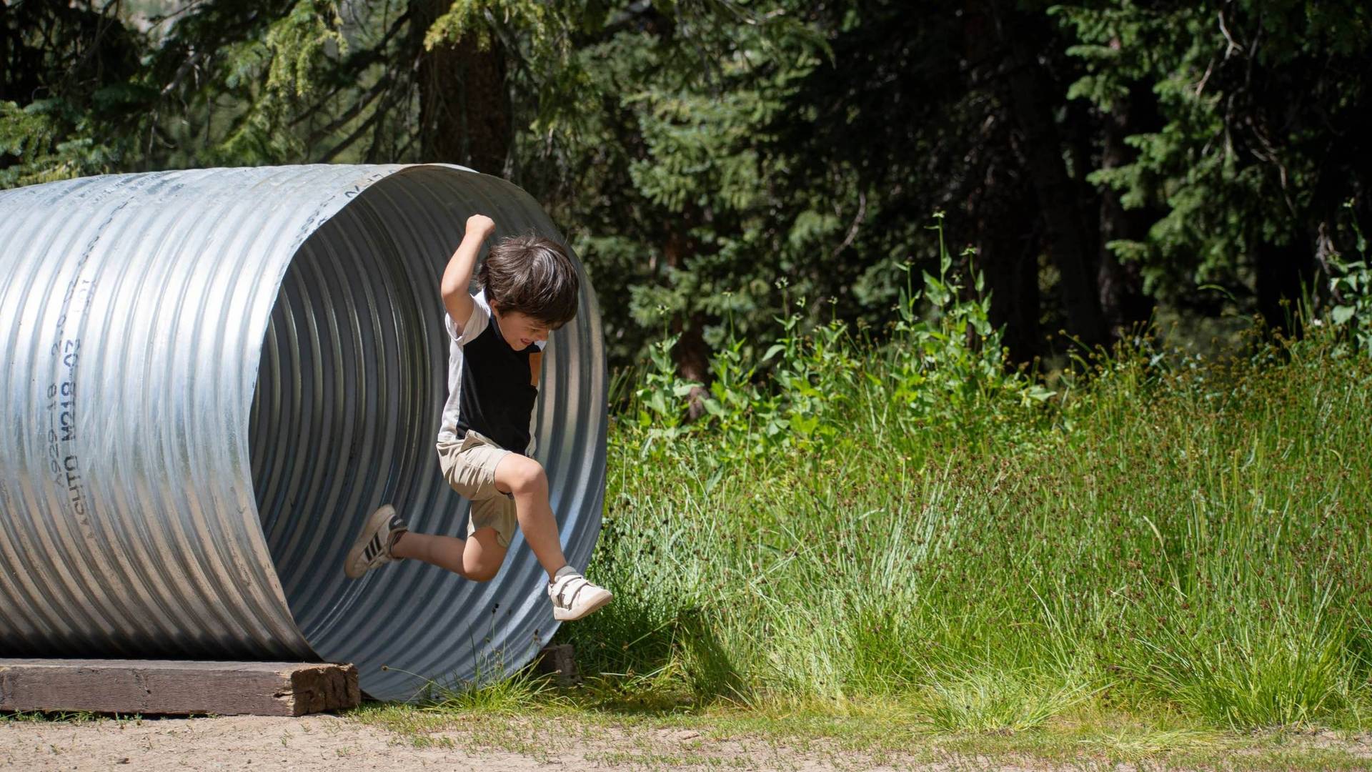 Kid running through obstacle in the Majestic Scramble at Brighton Resort