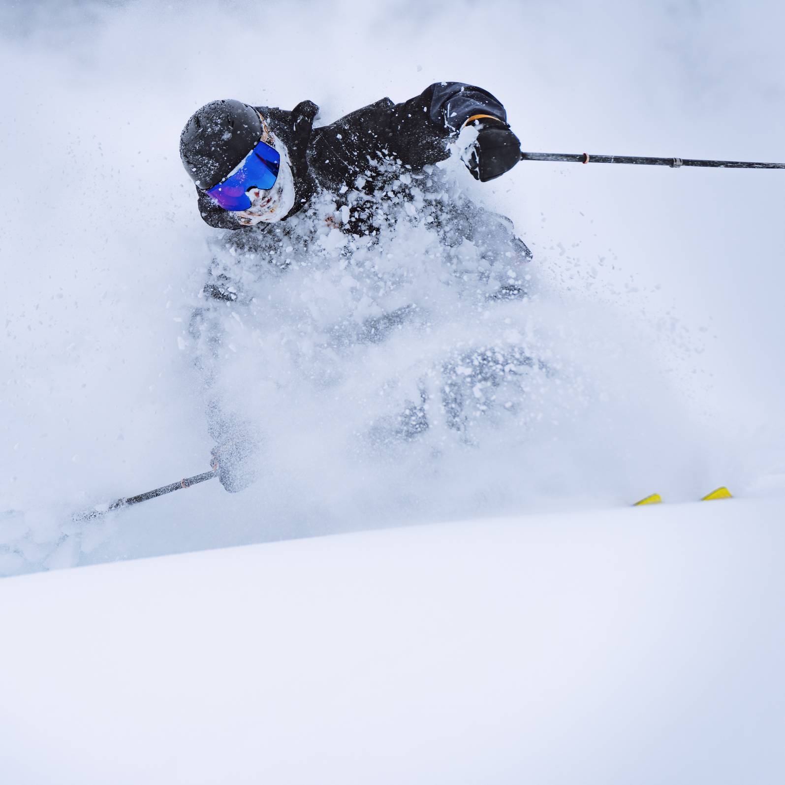 Skier on powder day at Brighton Utah