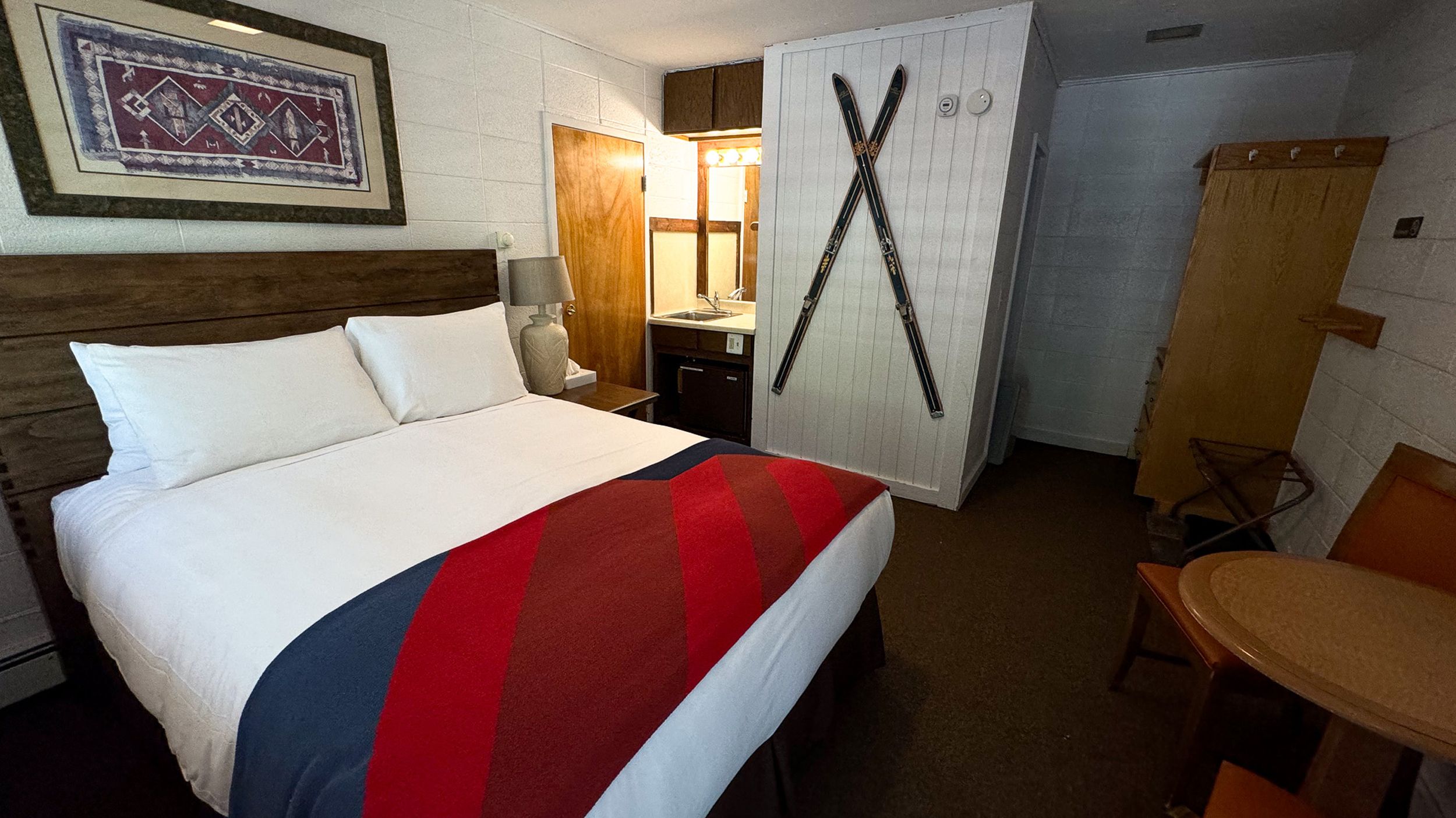 Queen bed room lodging at Brighton Resort