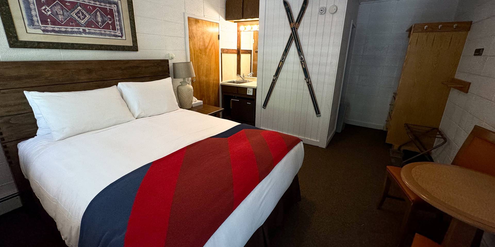 Queen bed room lodging at Brighton Resort