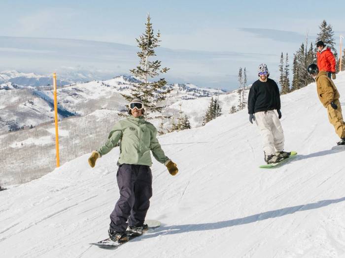 Group of friends riding together at Brighton Ski Resort