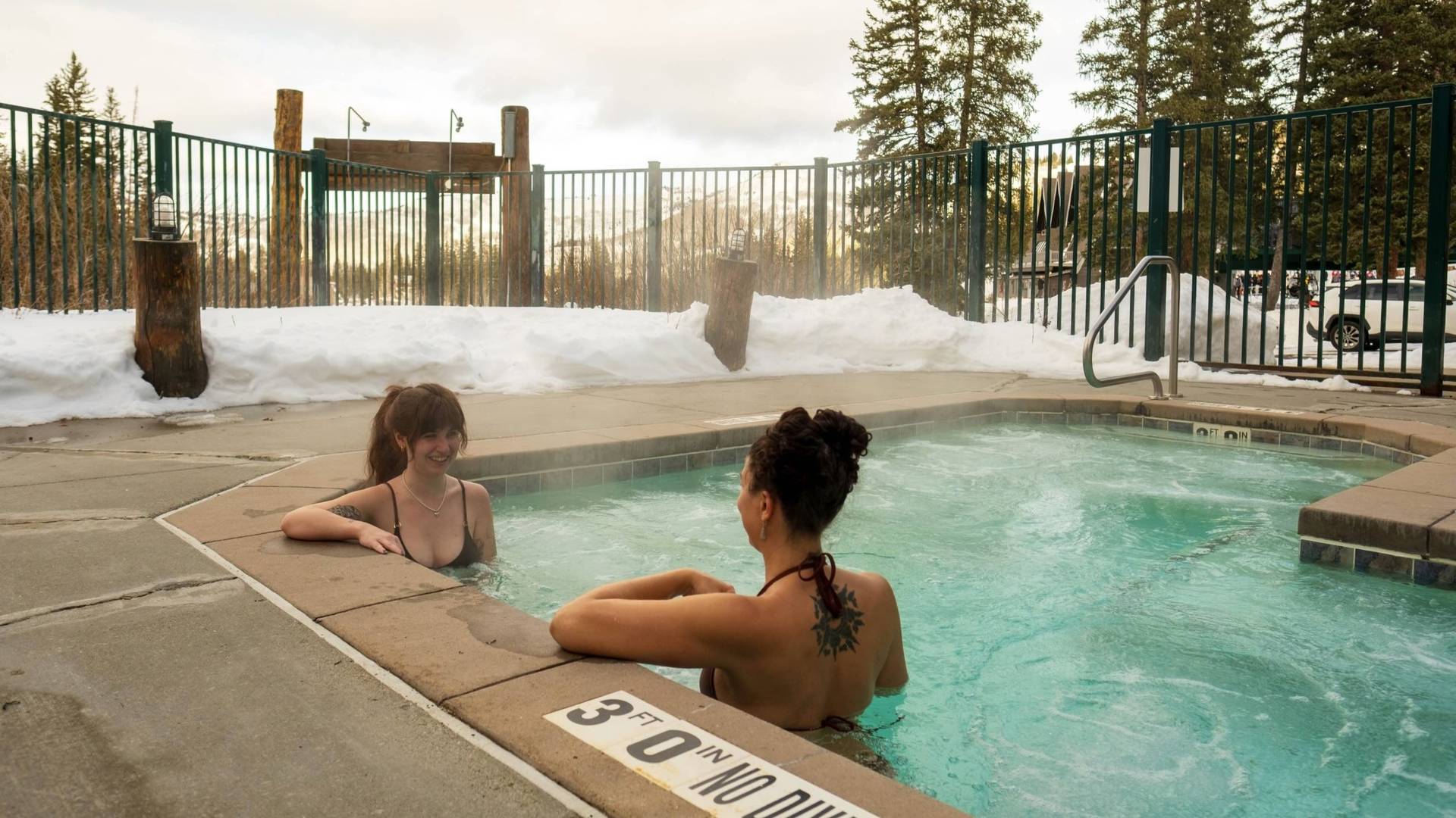 Friends in the hot tub at the Brighton Lodge