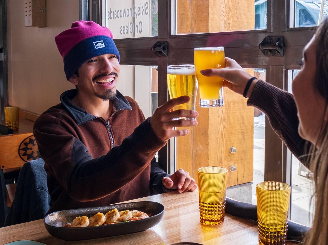 Couple eating at the Milly Chalet