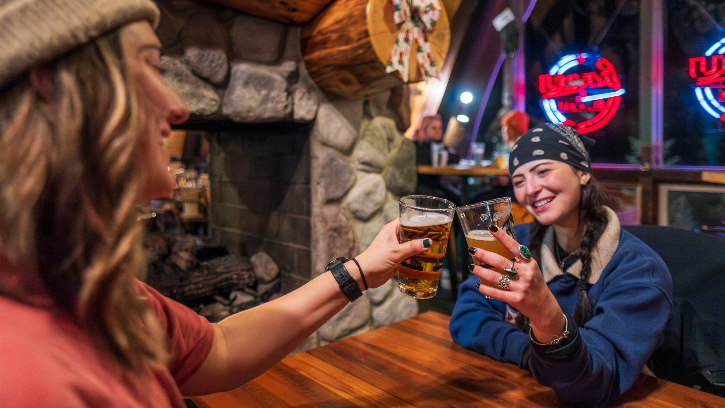Friends eating a soft pretzel at Molly Green's