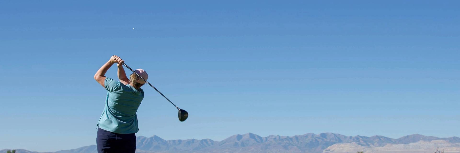Golfer swing at Brighton Golf Tournament