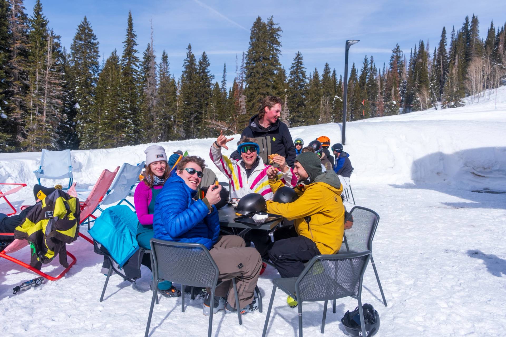 Group of friends eating at the Sidewinder In Brighton Utah