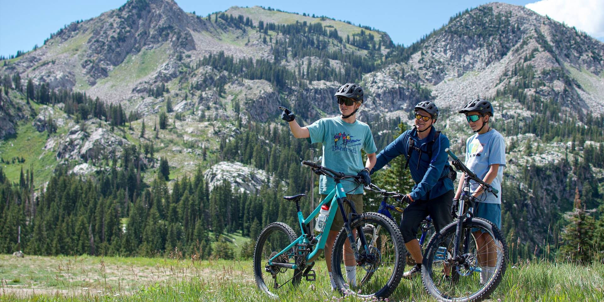 Family mountain biking together at Brighton Resort in the summer