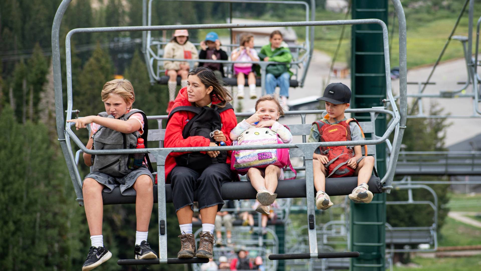 Summer camp kids on lift at Brighton, Utah