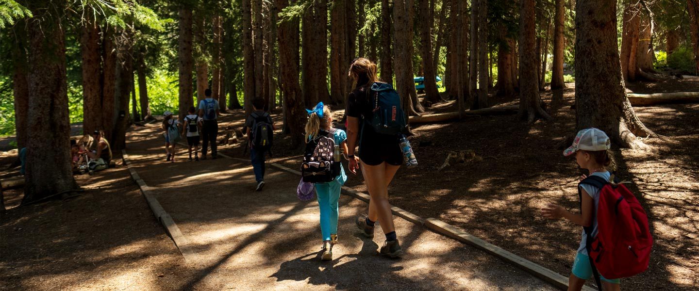 Summer campers hiking at Brighton Resort