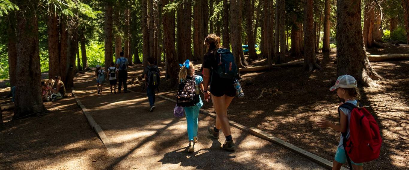 Summer campers hiking at Brighton Resort