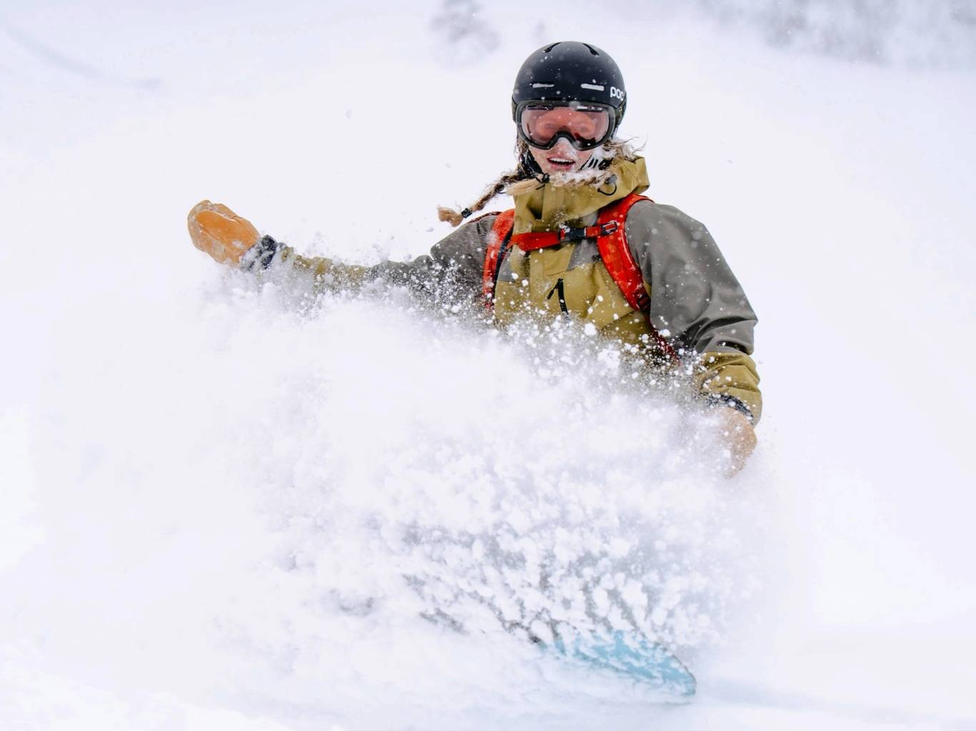 Snowboarding on a powder day at Brighton Resort