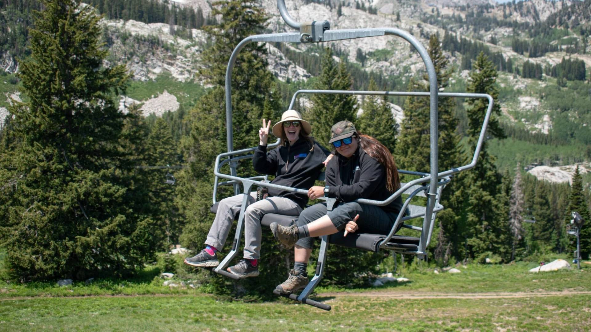 Friends riding majestic lift together at Brighton Resort