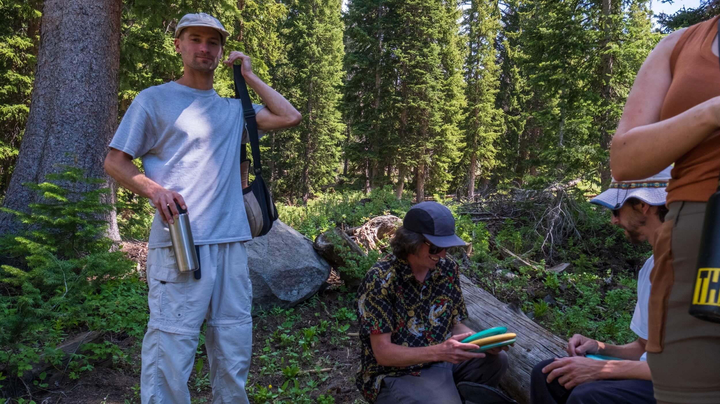 Group of friends disc golfing at Brighton Resort together during the summer