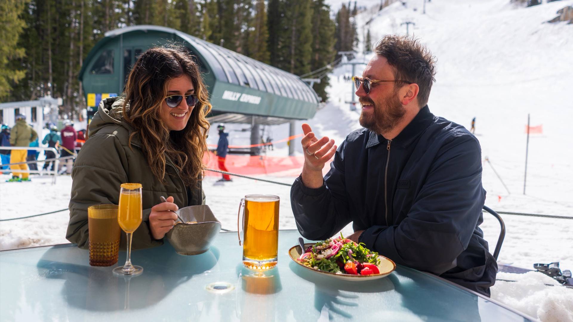 Couple eating brunch at the Milly Chalet in Brighton, Utah