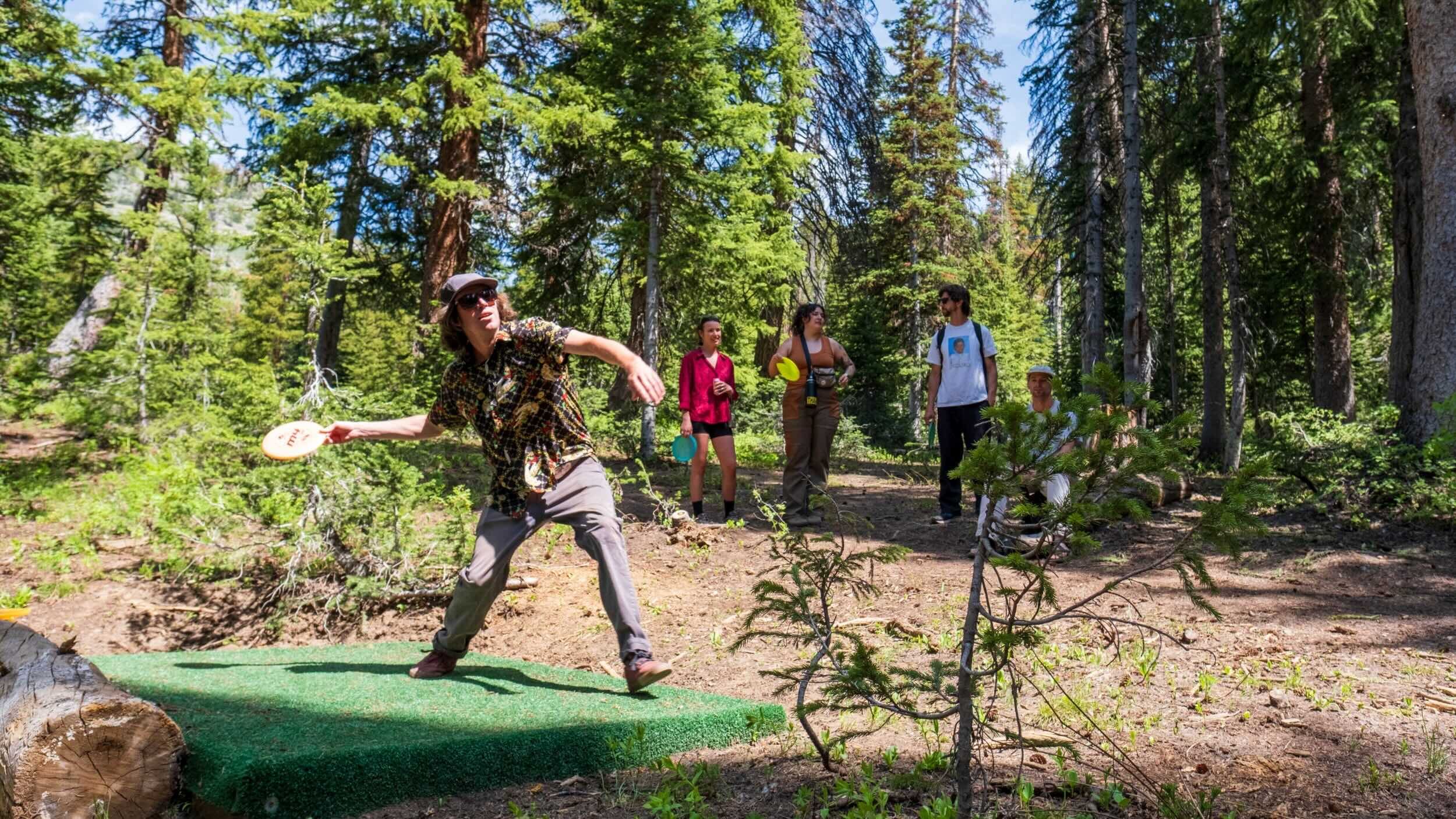 Disc golfers at Brighton Resort in the summer