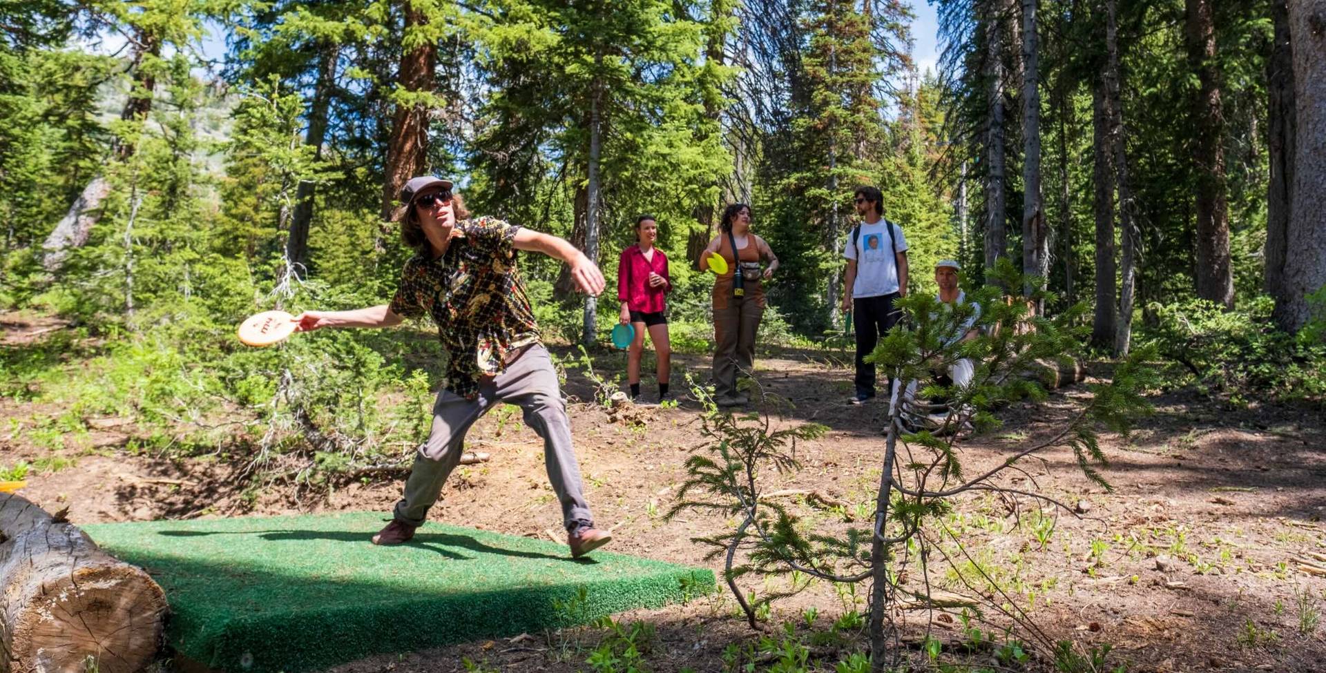 Disc golfers at Brighton Resort in the summer