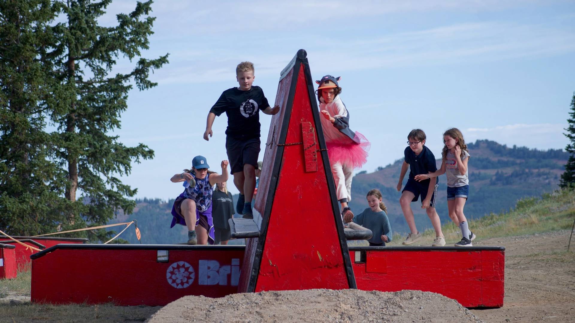 Kids running an obstacle in the Majestic Scramble at Brighton Resort