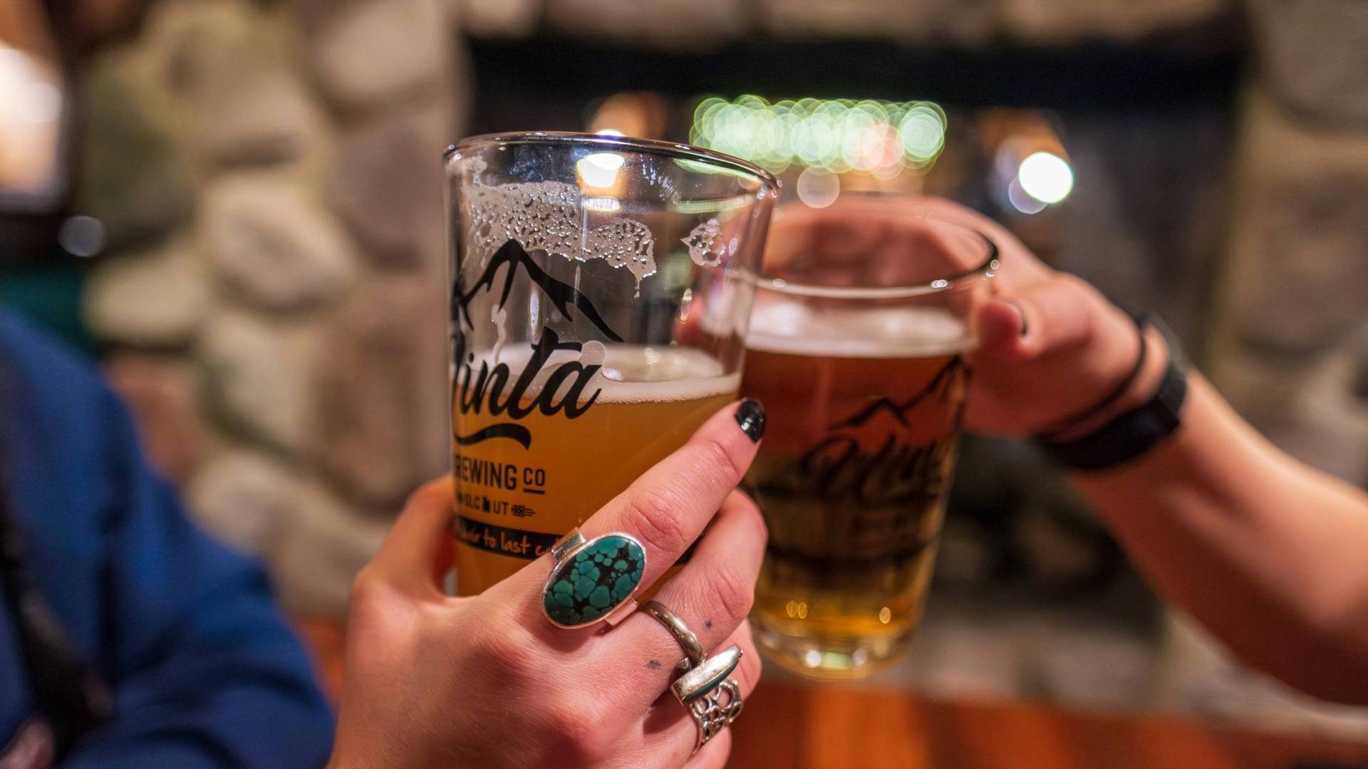 Friends cheers beer at Molly Green's at Brighton Resort