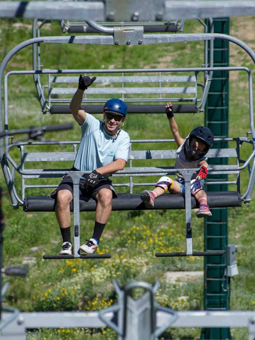 Family mountain biking at Brighton Resort in the summer