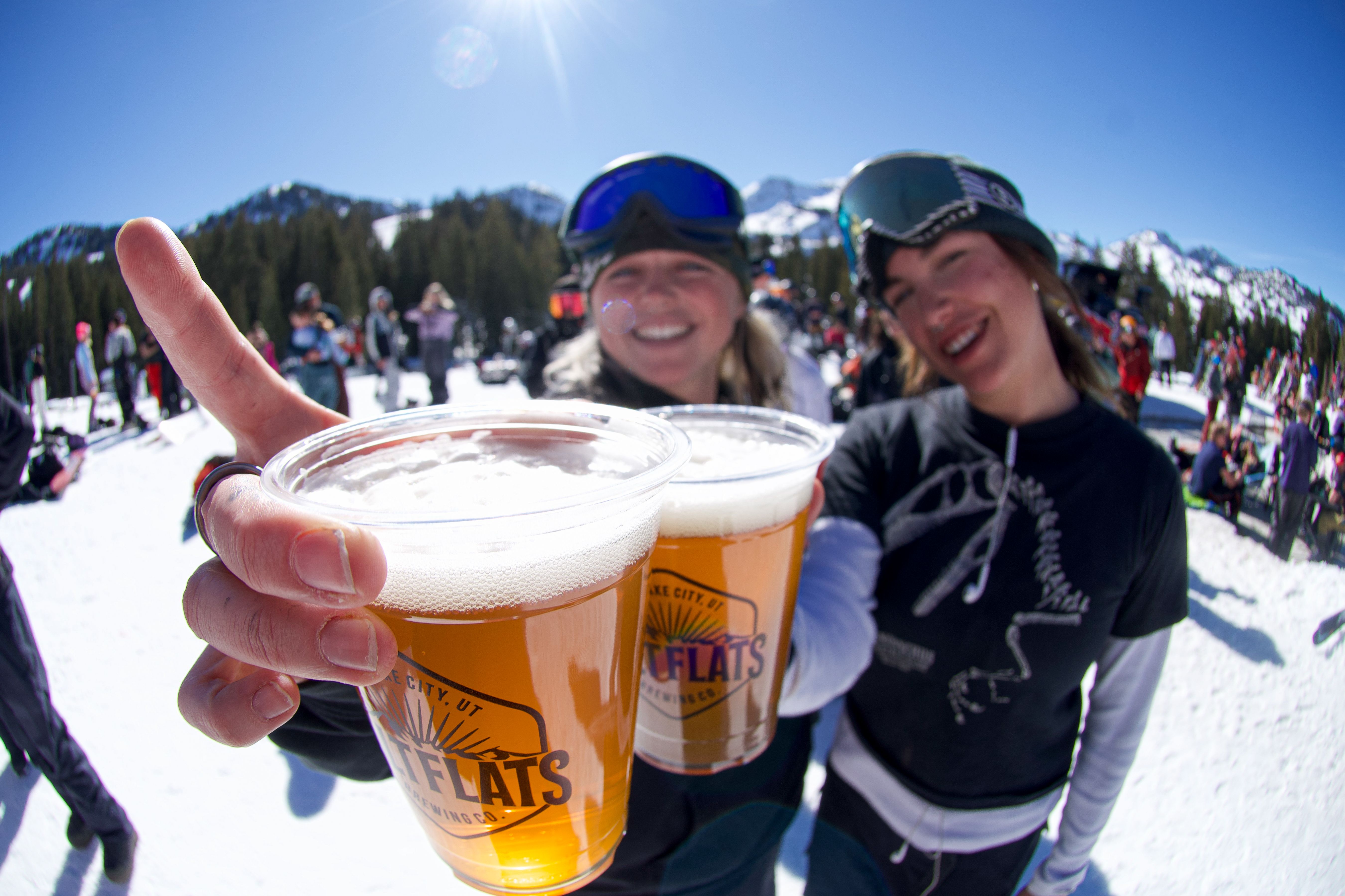 Friends drinking beer at the Sidewinder at Brighton Resort