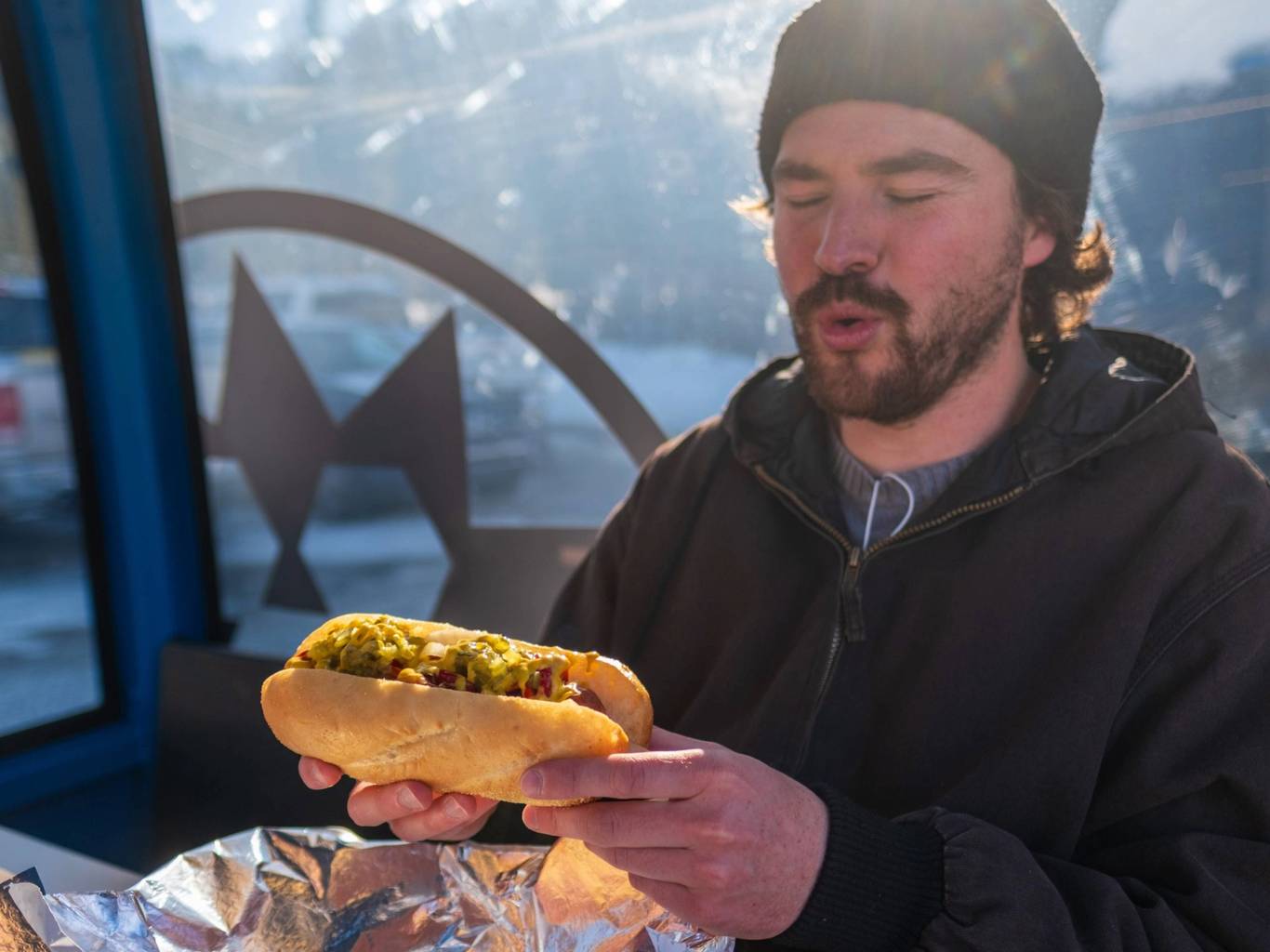 Eating hot dogs at Doyle's Dawgs