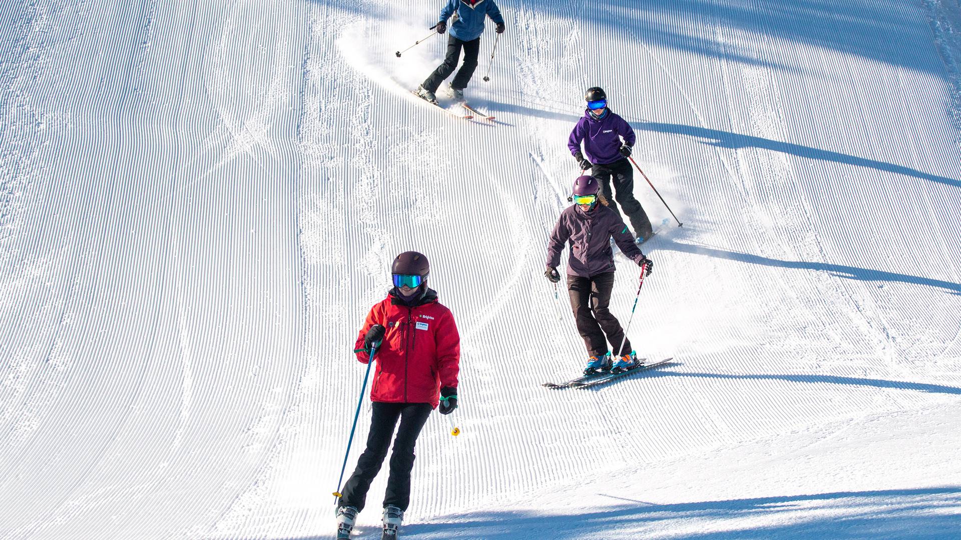 Brighton ski school instructor during adult group lesson