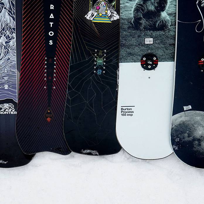 Performance rentals arranged side by side on the snow.