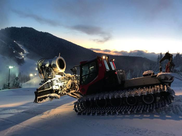 Snowcat carrying a snowgun.