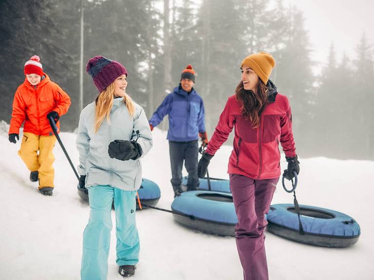 Family enjoys tubing at Gnarley's Tube Park at Cypress Mountain.