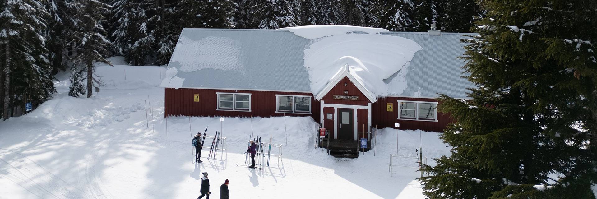 A group of skiers and snowshoers arrive at Cypress Mountain's Hollyburn Lodge.