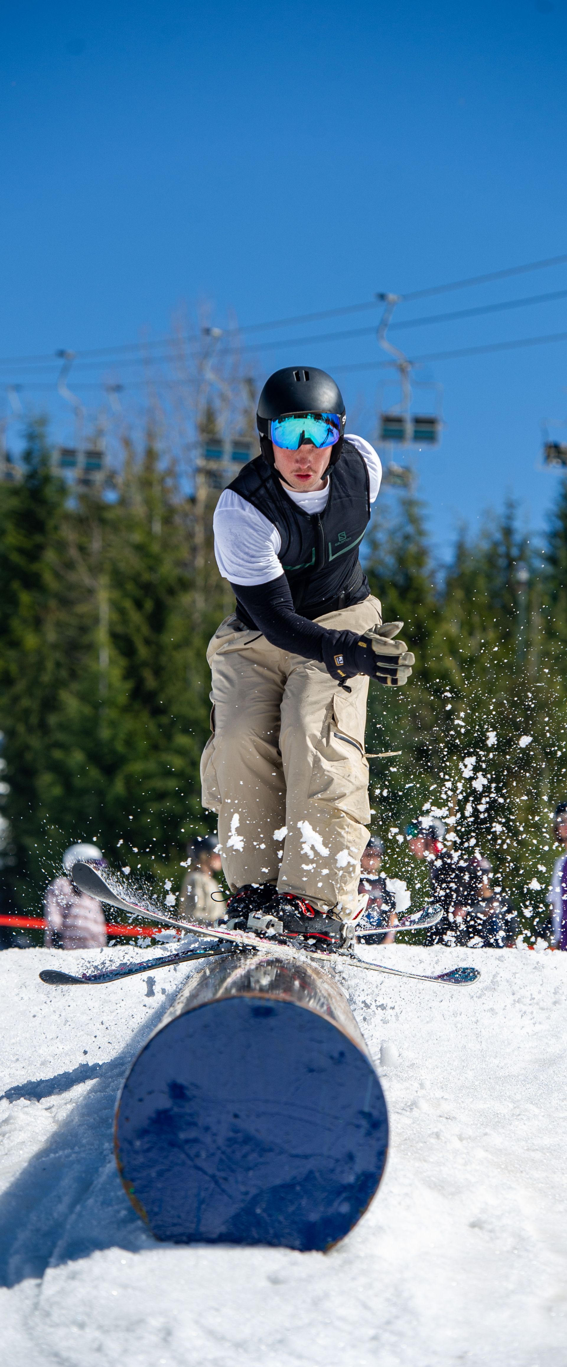 Skier on a pipe in the terrain park