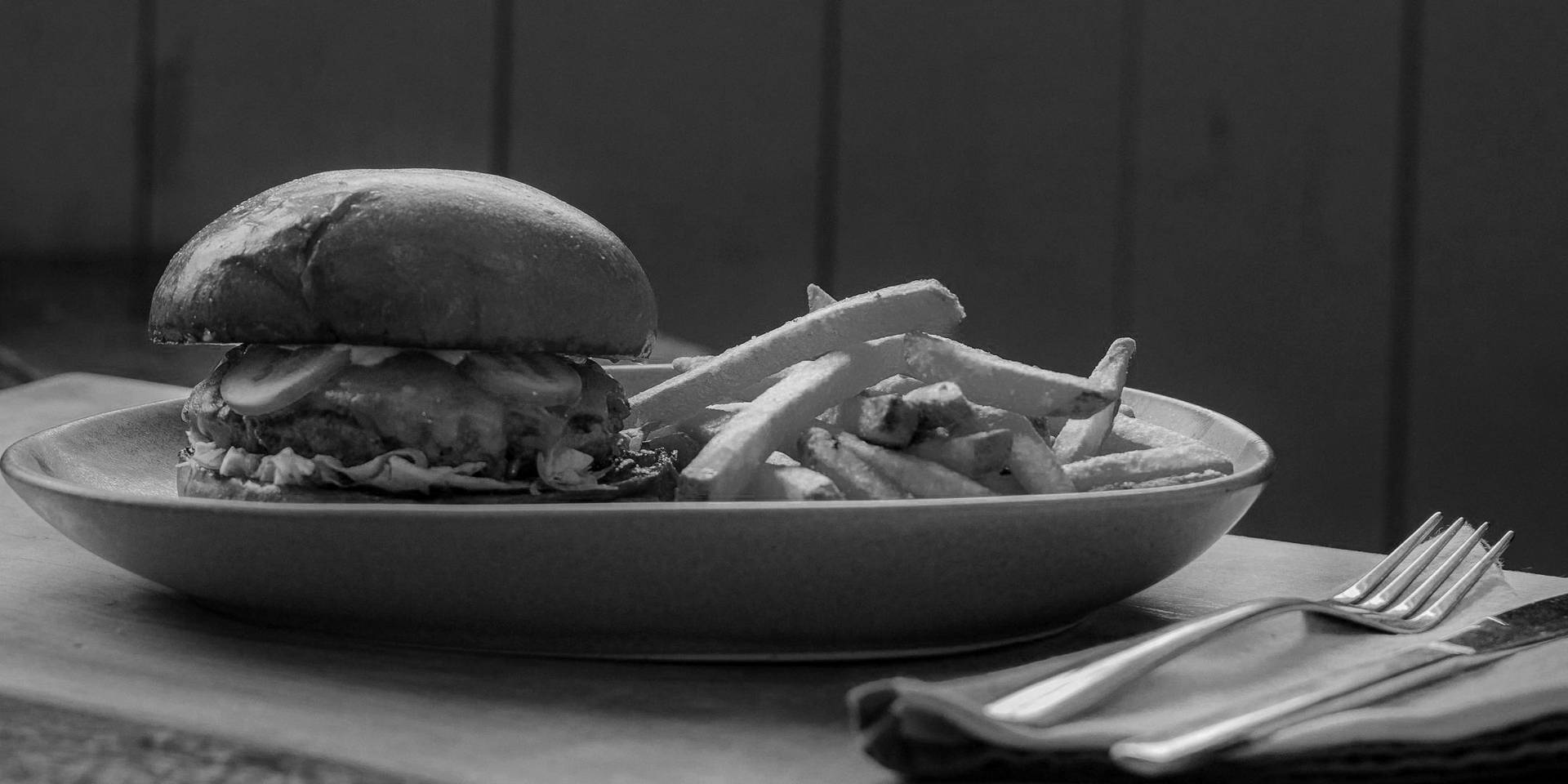 cheese burger with pickle lettuce and coleslaw served with fries at Hollyburn Lodge