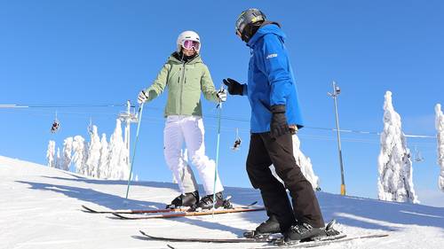 Group of adults being taught by an instructor