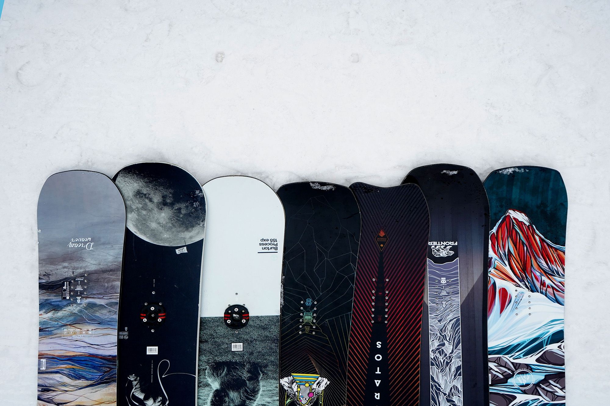 Performance rentals arranged side by side on the snow.