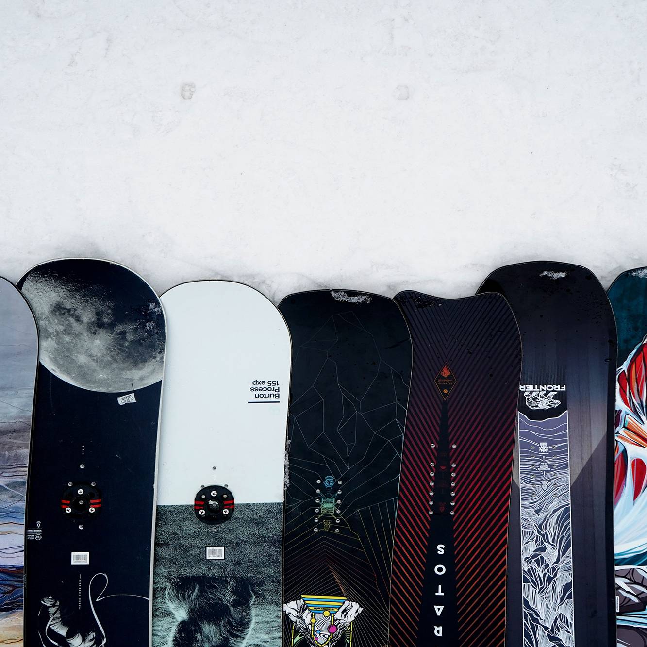 Performance rentals arranged side by side on the snow.