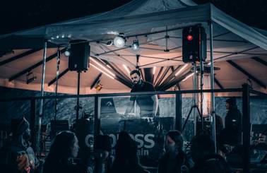 DJ performing on the patio for an apres event.