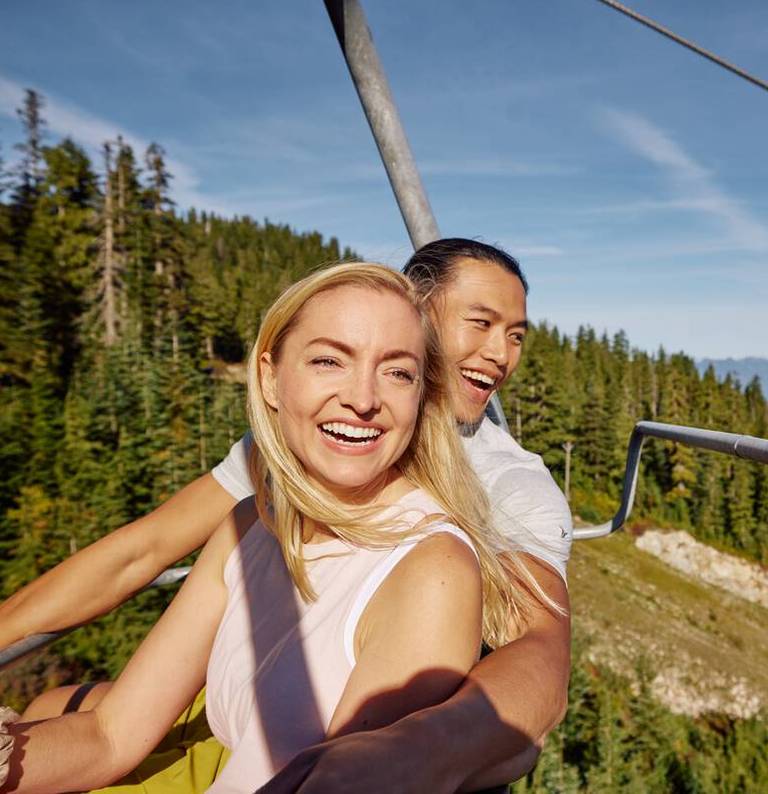 A couple on a scenic ride during sunny day.