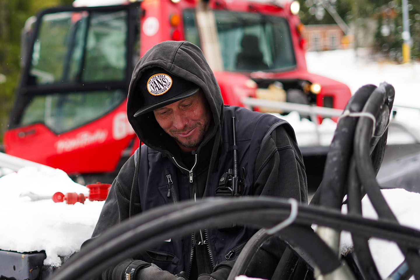 Cypress employee working on snowcat maintenance.