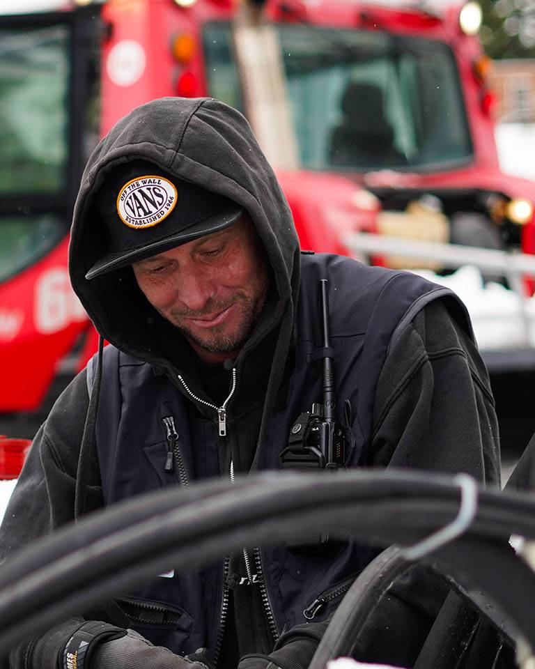 Cypress employee working on snowcat maintenance.