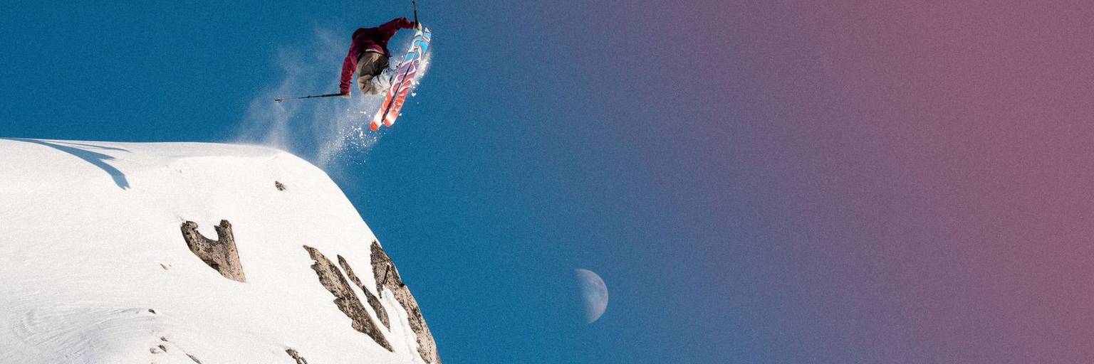 A skier does a ski jump at the Cypress Mountain terrain park