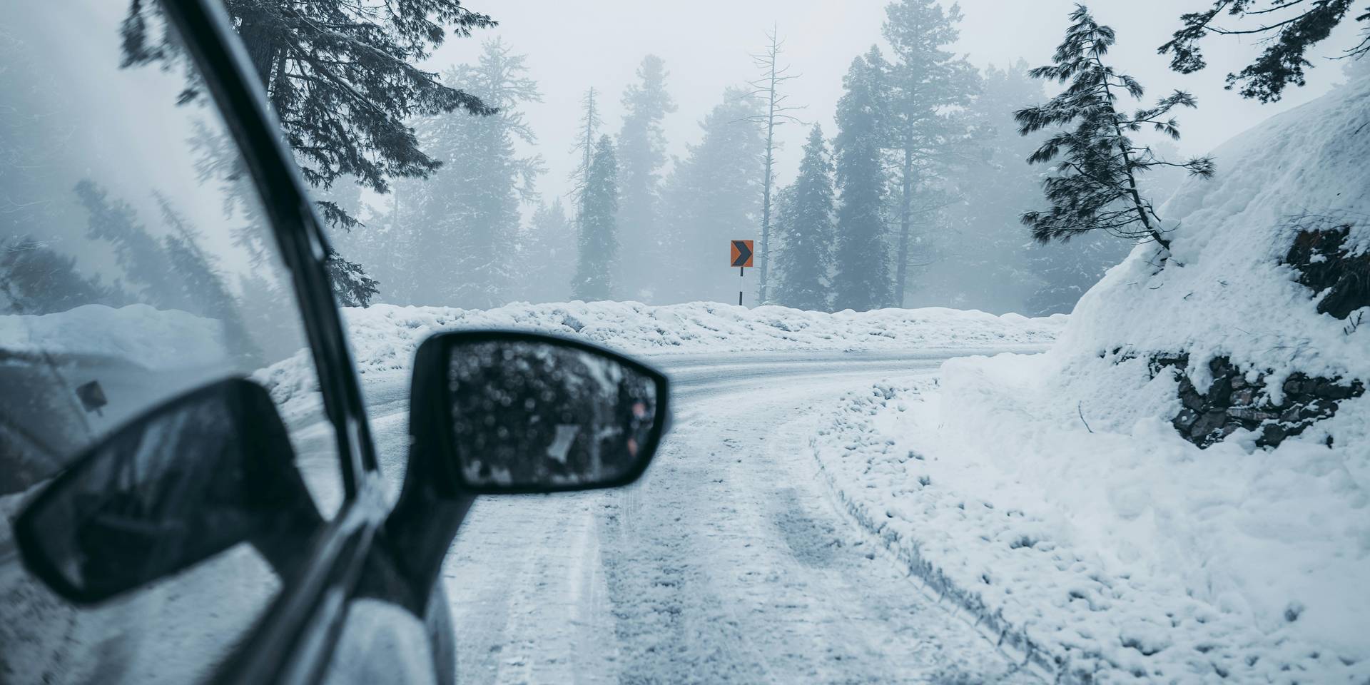 Car on a snowy road.