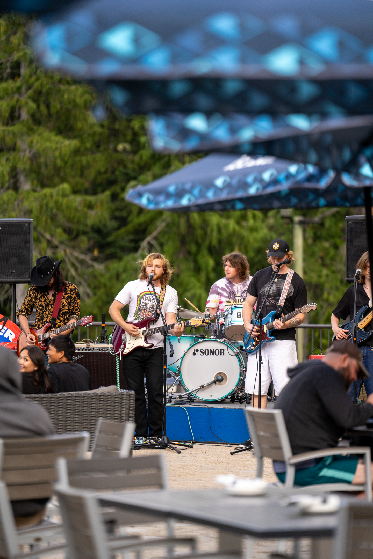 band playing on crazy raven patio